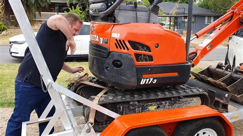 mini excavator on a trailer|mini excavator tie down requirements.